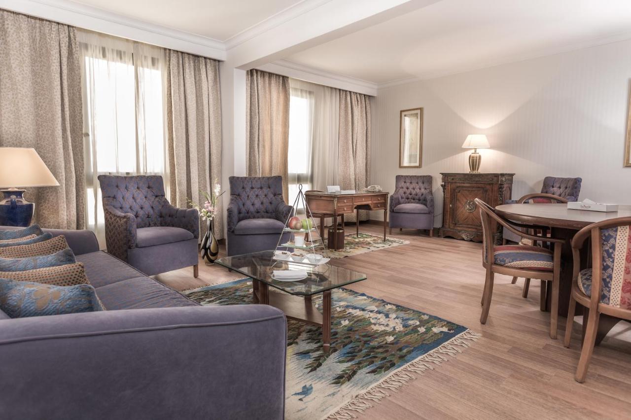 Le Passage Cairo Hotel & Casino Exterior foto A living room